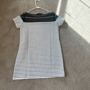 Mini dress .. mesh on top . I wear with jeans too .